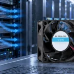 DC axial cooling fan mounted in front of server racks in a data center cold aisle